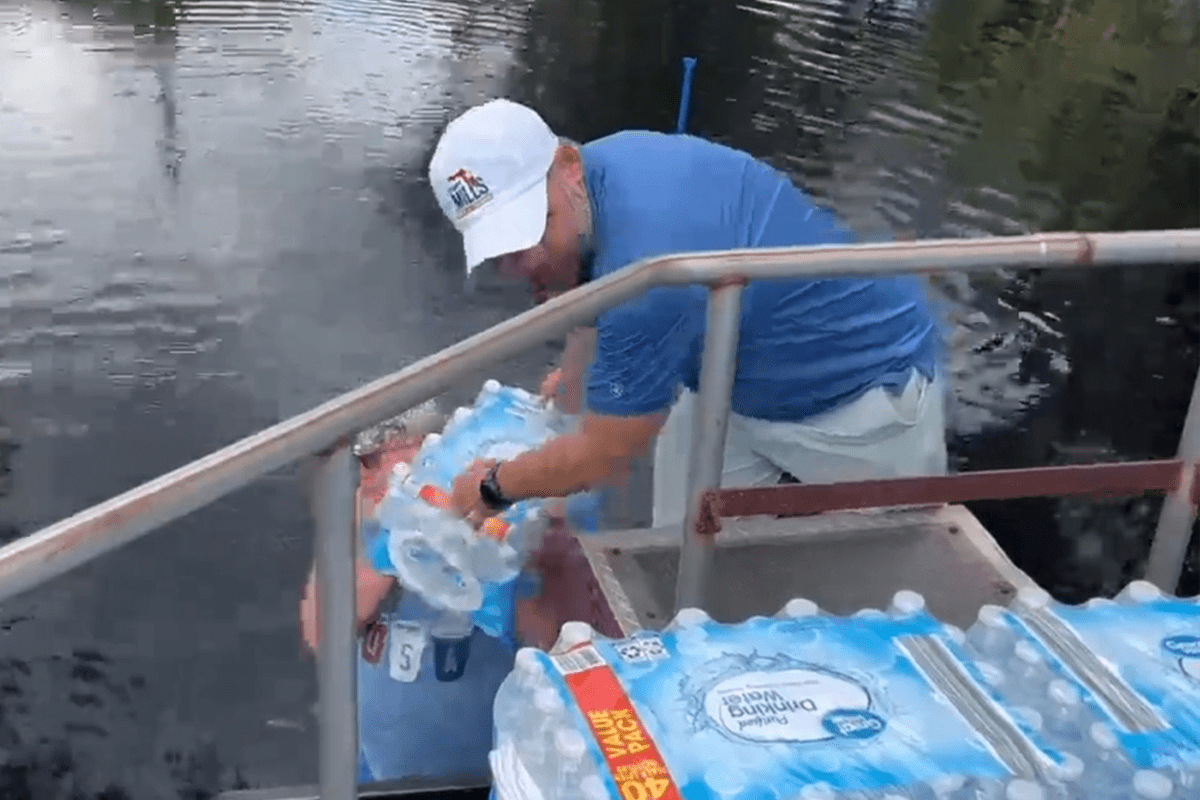 Cory Mills helping distribute water to Hurricane Ian-impacted Florida community, Oct. 4, 2022.
