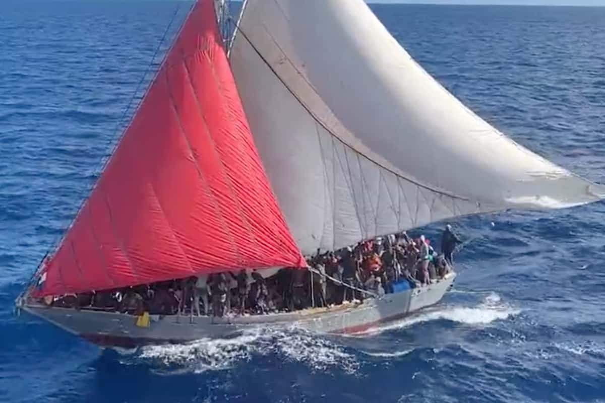 Nearly 400 migrants aboard a 50-foot vessel which was stopped in the Bahamas.