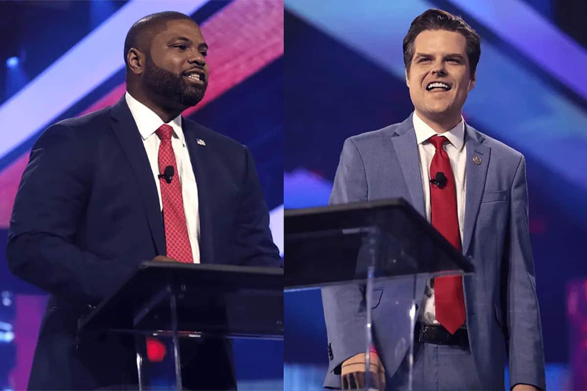 Rep. Byron Donalds, R-Fla., and Re. Matt Gaetz, R-Fla., speaking with attendees at the 2022 AmericaFest at the Phoenix Convention Center in Phoenix, Ariz., Dec. 18, 2022. (Photo/Gage Skidmore)
