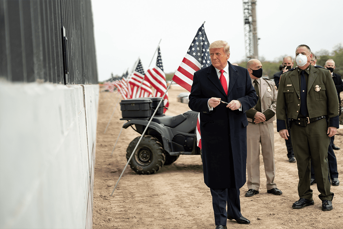 President Donald Trump prepares to sign a plaque placed along the border wall Tuesday, Jan. 12, 2021, at the Texas-Mexico border near Alamo, Texas. (Photo/Trump White House Archived, Flickr)