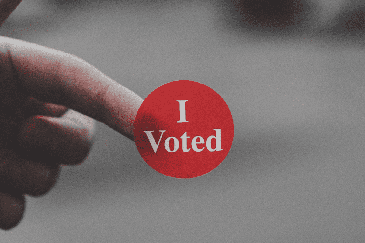 "I Voted" sticker, Aug. 14, 2018. (Photo/Parker Johnson, Unsplash)
