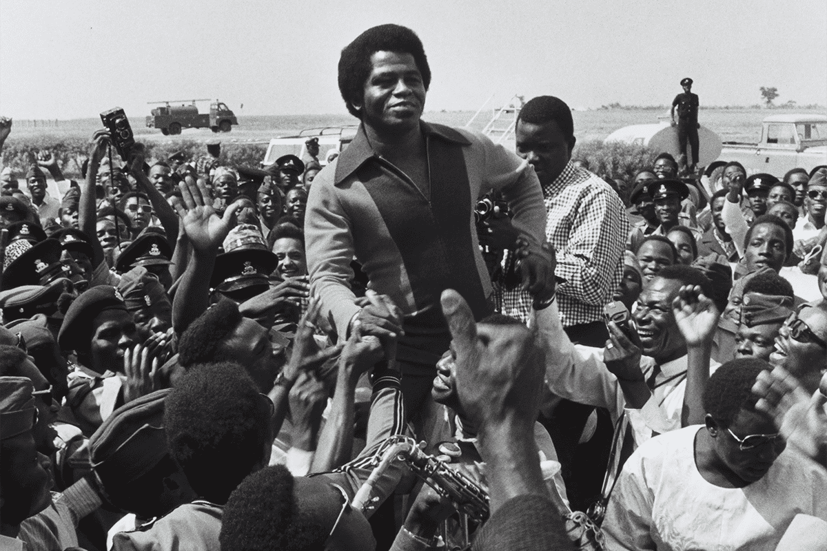 Singer James Brown being greeted by fans upon his arrival at Kaduna Airport, 1970. (Photo/The New York Public Library, Unsplash)