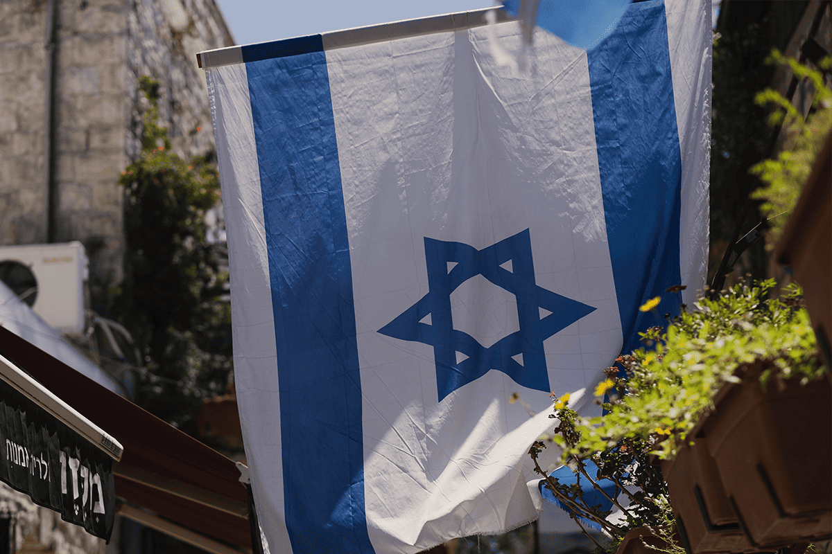 Israel flag, Sept. 29, 2021. (Photo/Levi Meir Clancy, Unsplash)