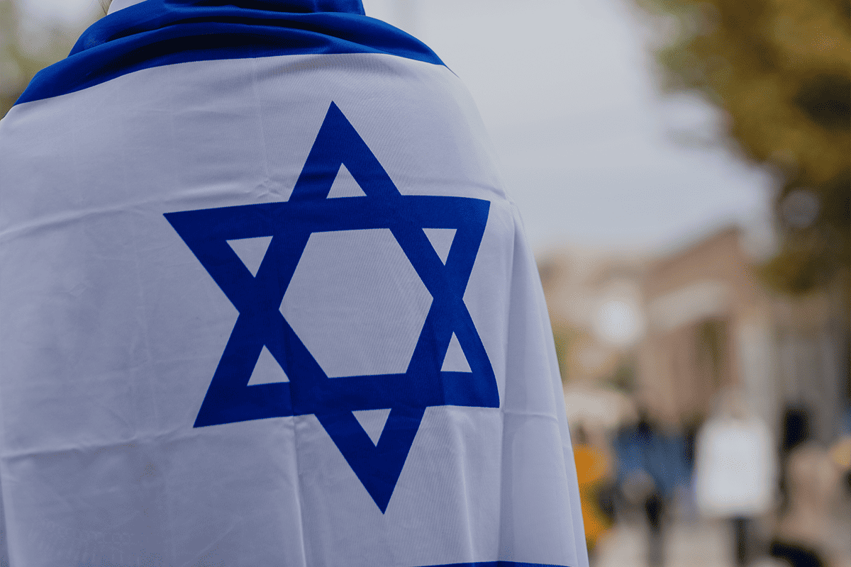 Israel flag, April 19, 2021. (Photo/Levi Meir Clancy, Unsplash)