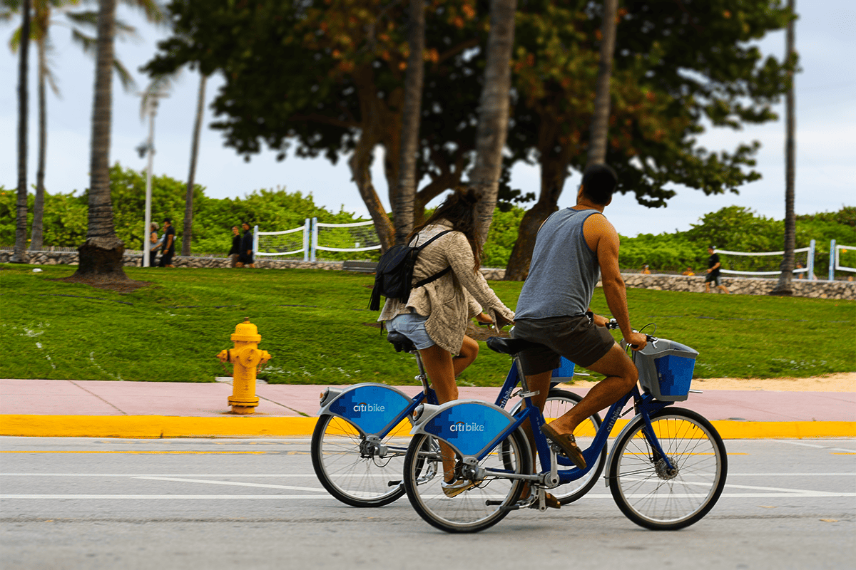 People riding bikes in Miami, Fla., May 13, 2022. (Photo/Amy Syiek, Unsplash)