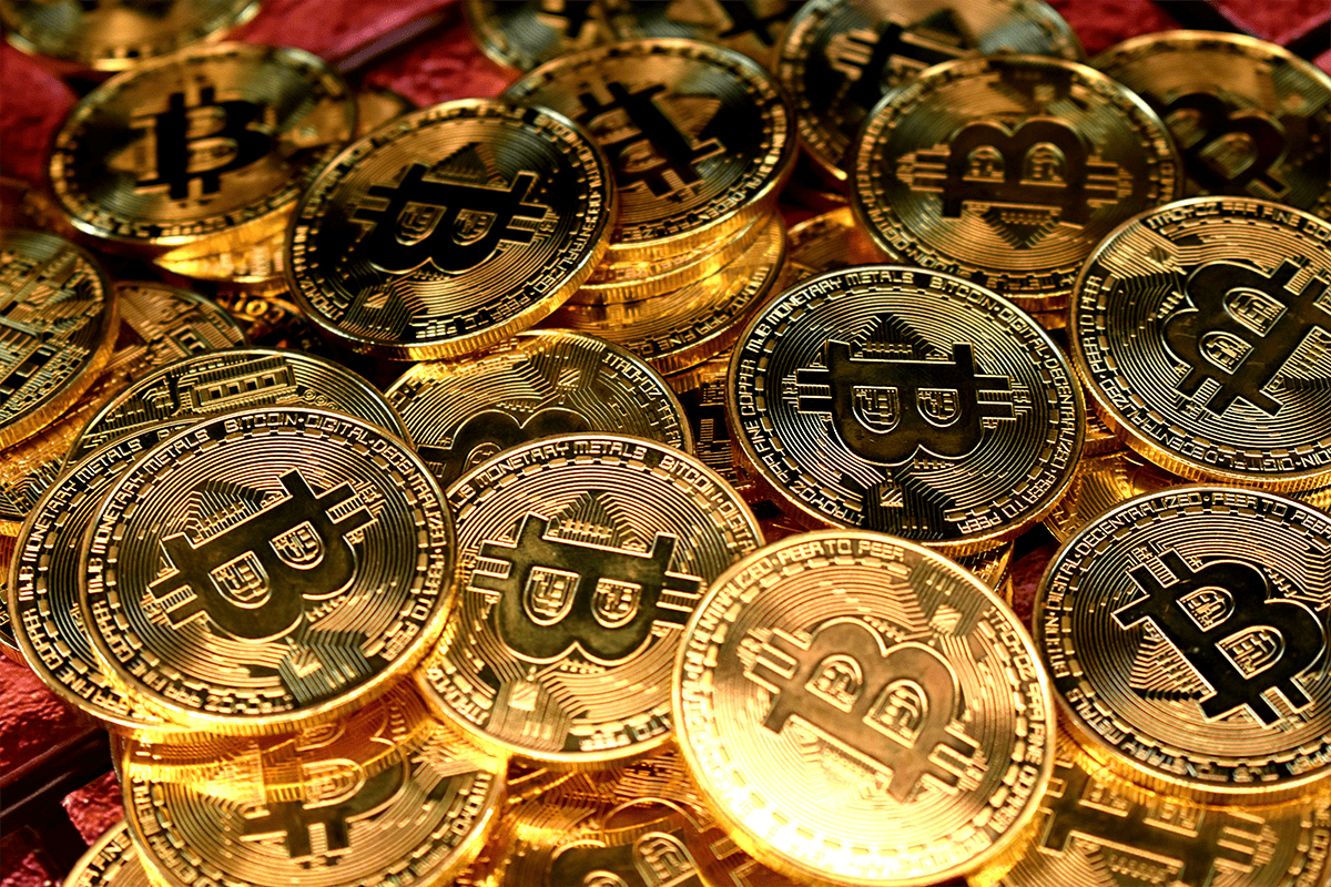 Pile of bitcoins, Jan. 3, 2021. (Photo/Kanchanara, Unsplash)
