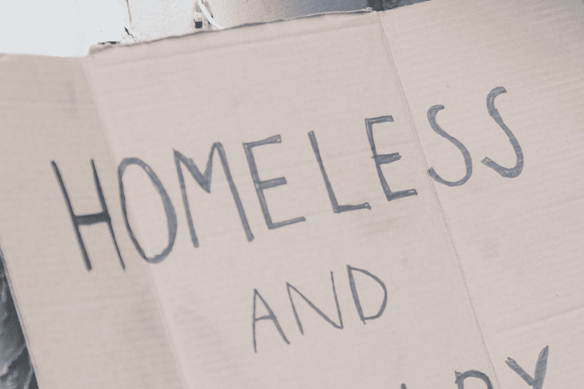 "Homeless" sign, Aug. 11, 2021. (Photo/Timur Weber, Pexels)