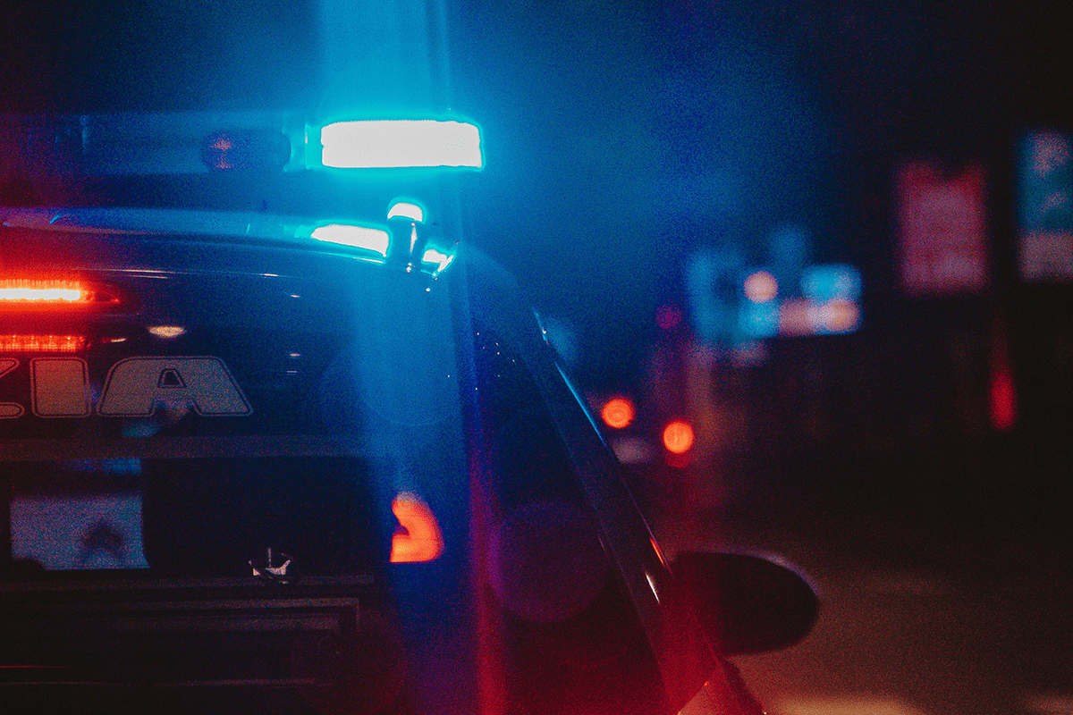 Police lights, July 21, 2019. (Photo/Andrea Ferrario, Unsplash)