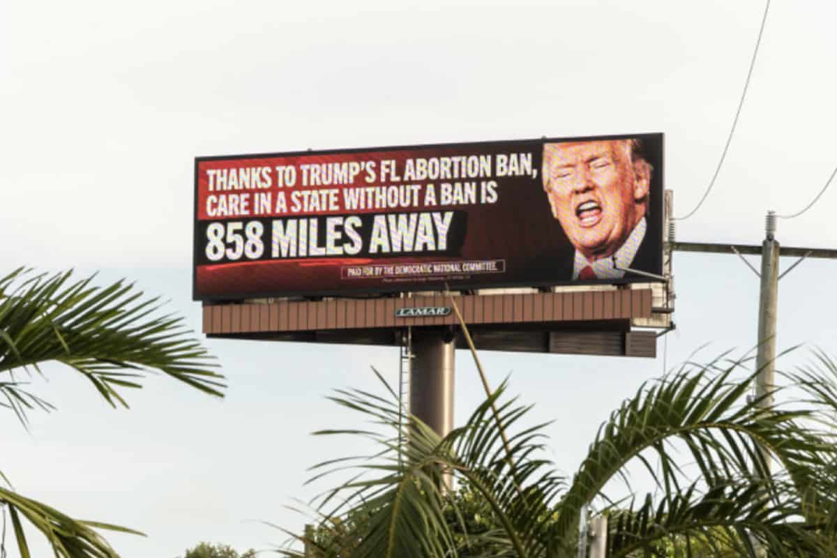 <a href=https://democrats.org/news/photos-dnc-hammers-trump-on-abortion-across-florida-as-extreme-ban-takes-effect/>Anti-former President Donald Trump sign sign in Hollywood, Fla.</a> (Photo/Democratic Party)