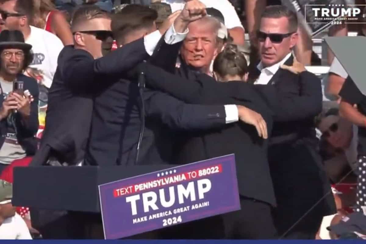 A defiant Trump stands after shots at Pennsylvania rally with blood on